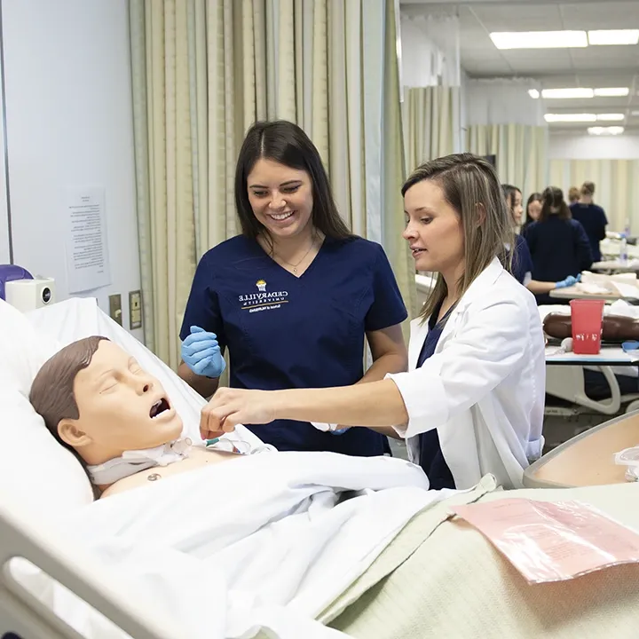 Nursing students practicing in the Sim Lab.